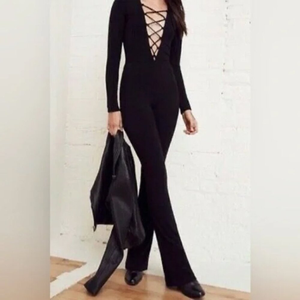 Reformation Black Lace Up Long Sleeved Flare Leg Stretch Jumpsuit Size 4